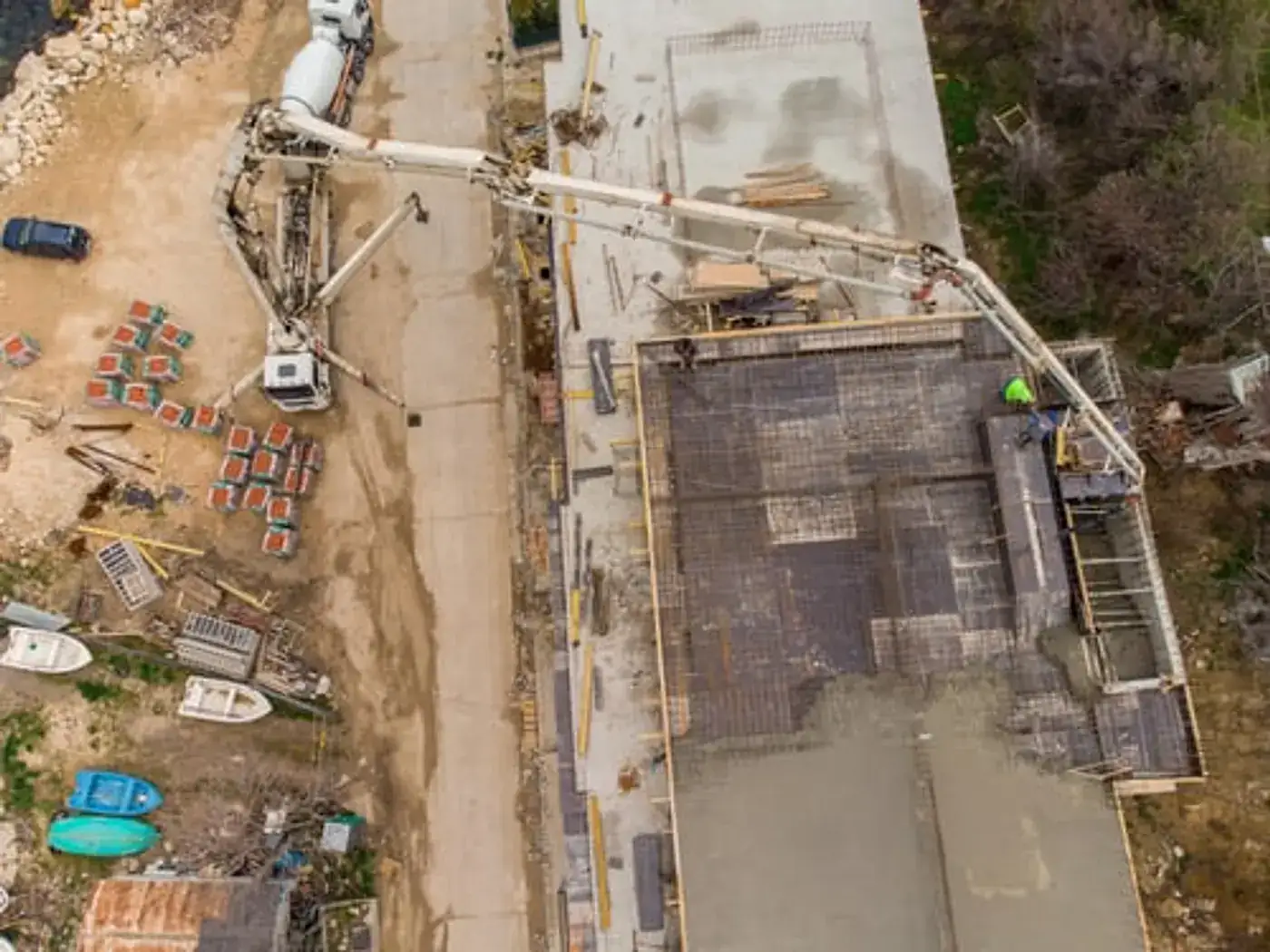 JMV Concrete Inc. crew placing a large reinforced concrete pour on a job site near Upland, California