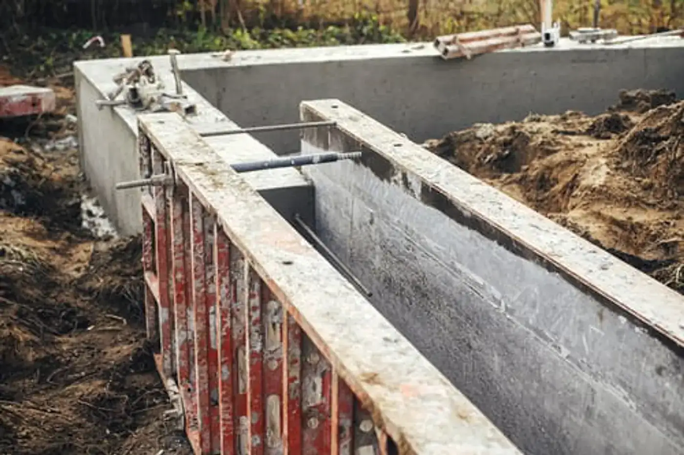 Formed and reinforced concrete foundation walls under construction on a JMV Concrete Inc. job site
